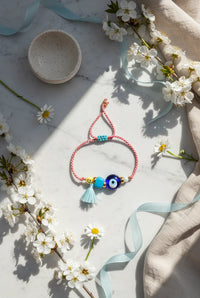 Large Blue Glass Eye With Tassel And Blue Bead