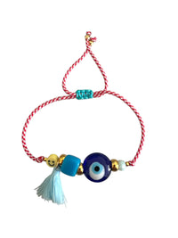 Large Blue Glass Eye With Tassel And Blue Bead